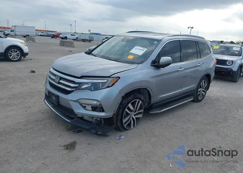 2017 Honda Pilot Touring z USA, uszkodzony, nr VIN 5FNYF5H98HB045265